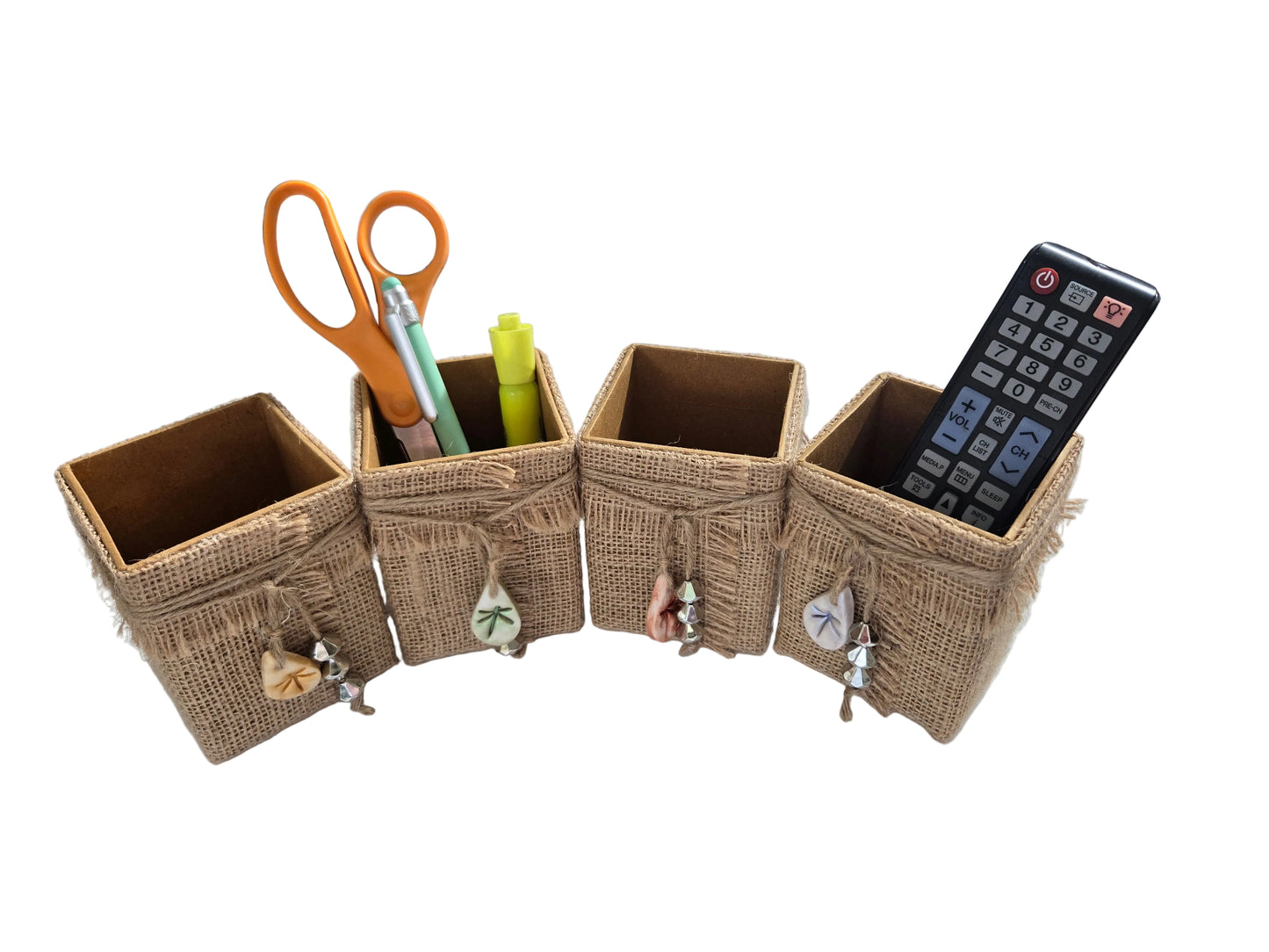Burlap desk organizer with office supplies on a desk