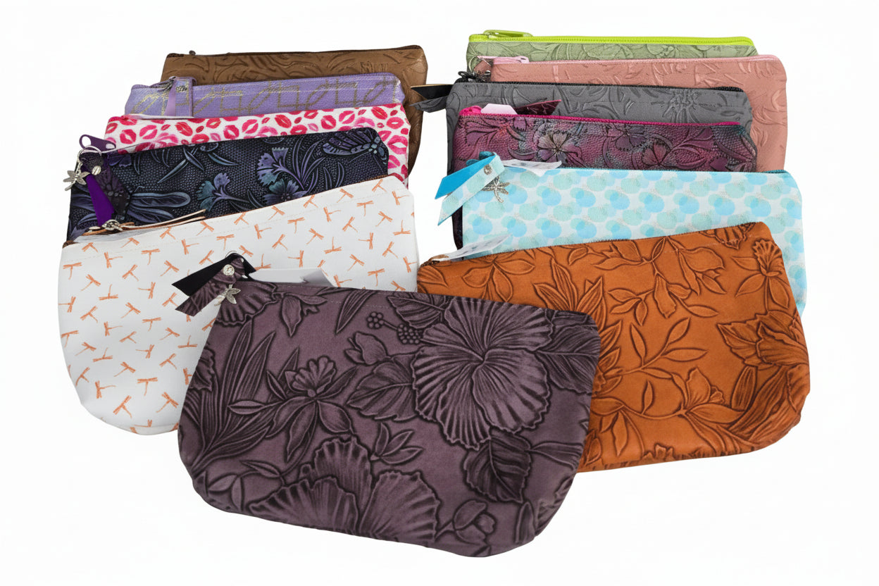 Collection of various patterned pouches on a gray background