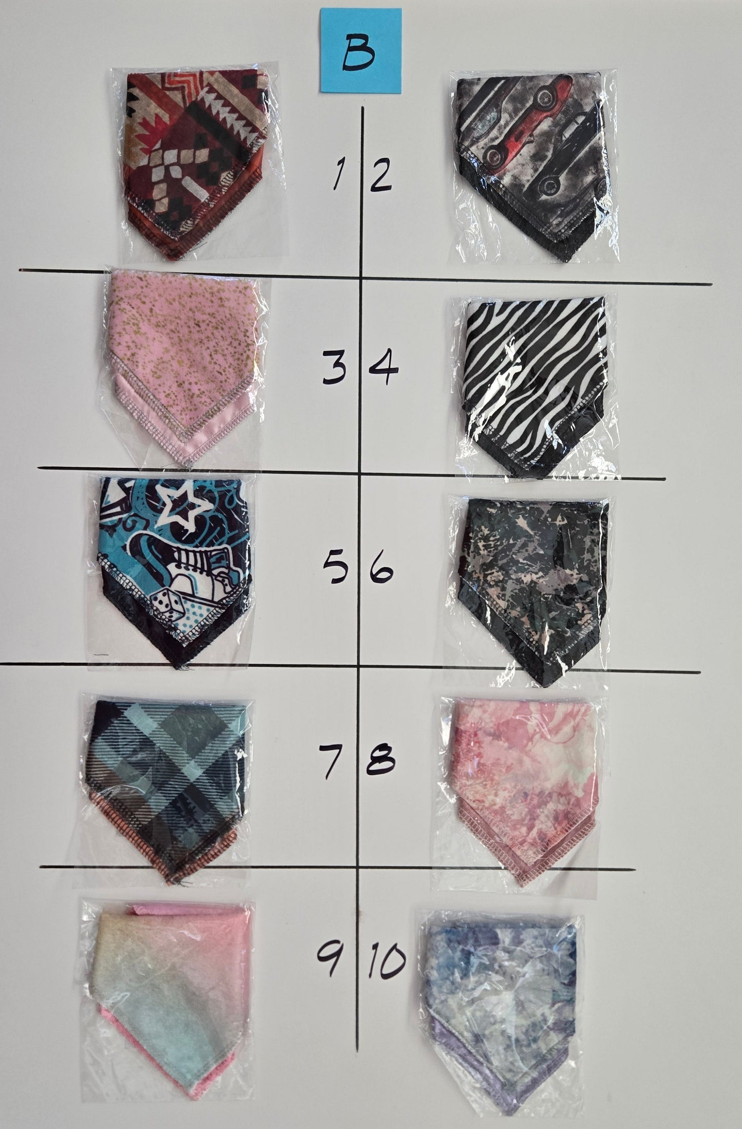 Fabric swatches arranged in a grid on a white sheet with labeled rows and columns.
