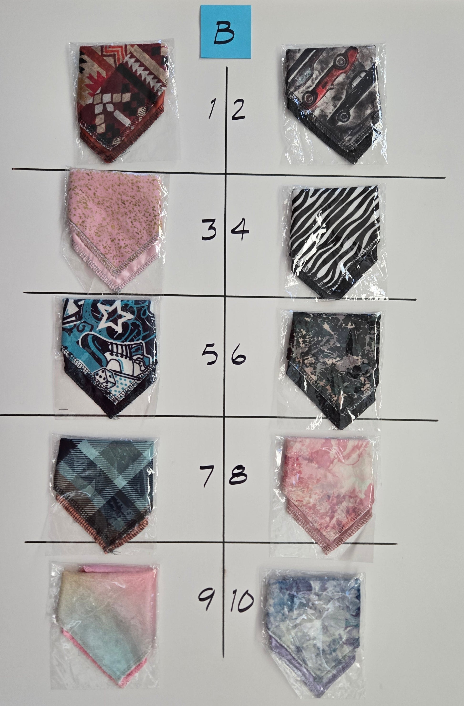 Fabric swatches arranged in a grid on a white sheet with labeled rows and columns.