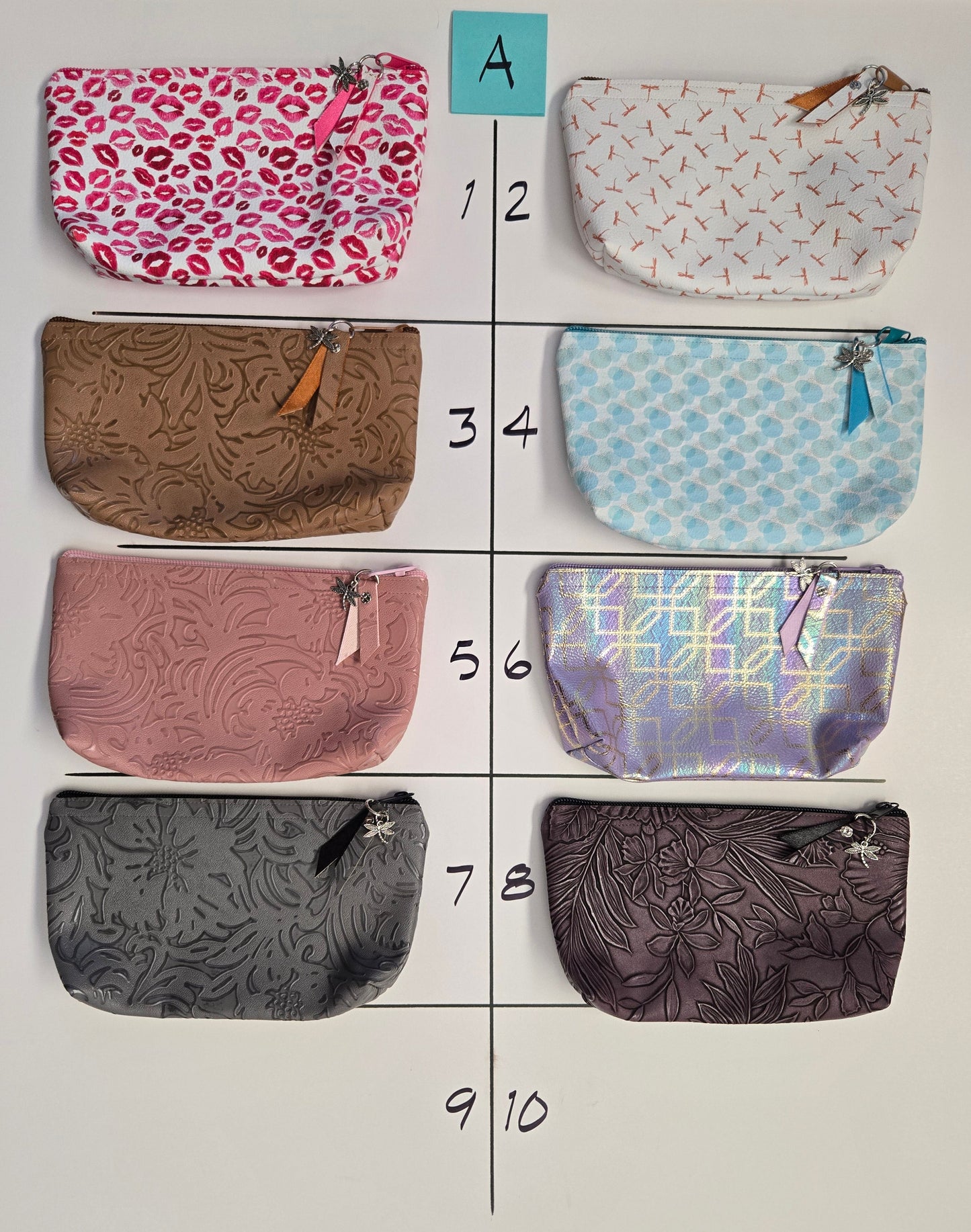 Eight patterned pouches arranged in a grid on a white background.