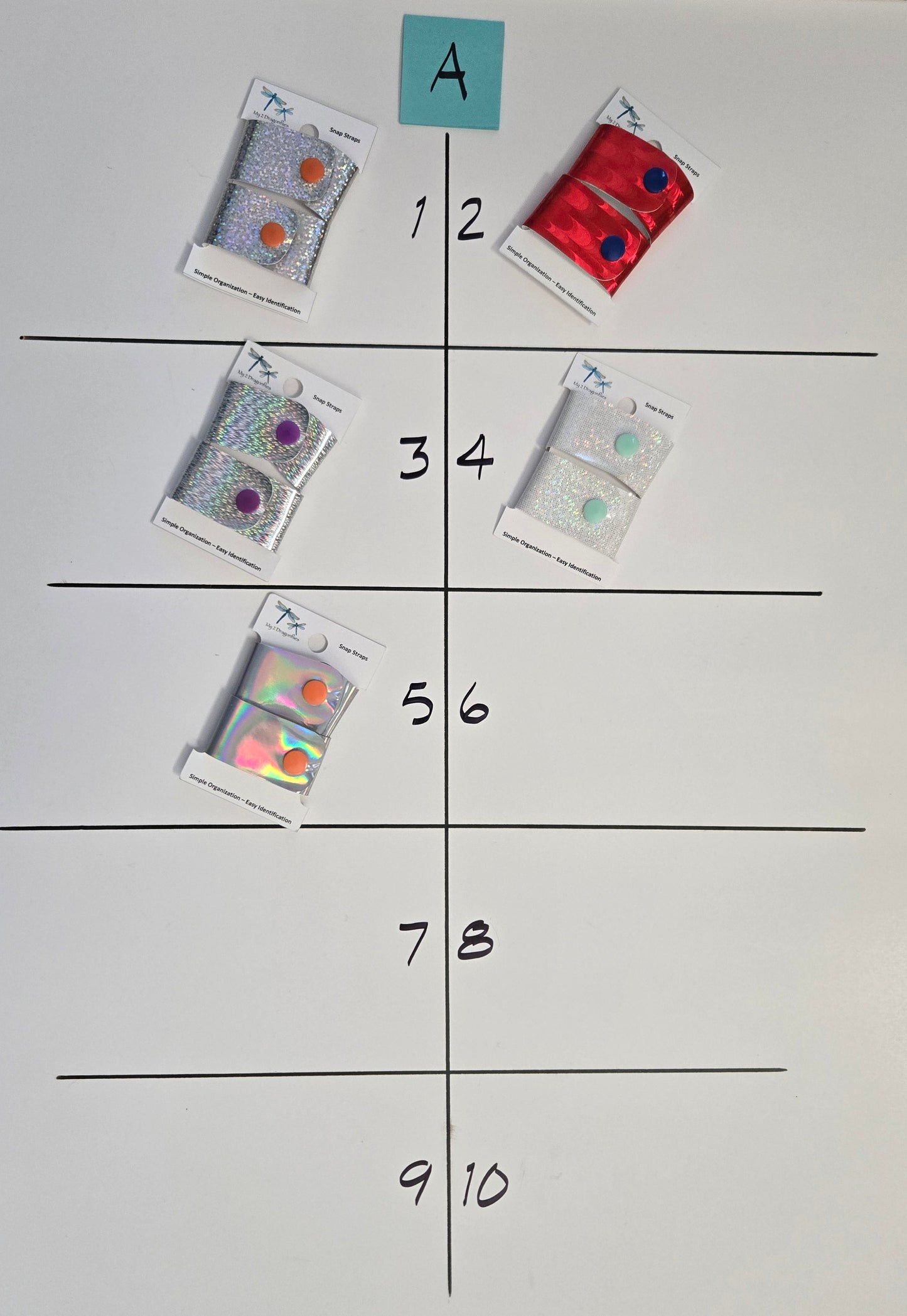 Five small packages on a grid with labeled squares on a gray background