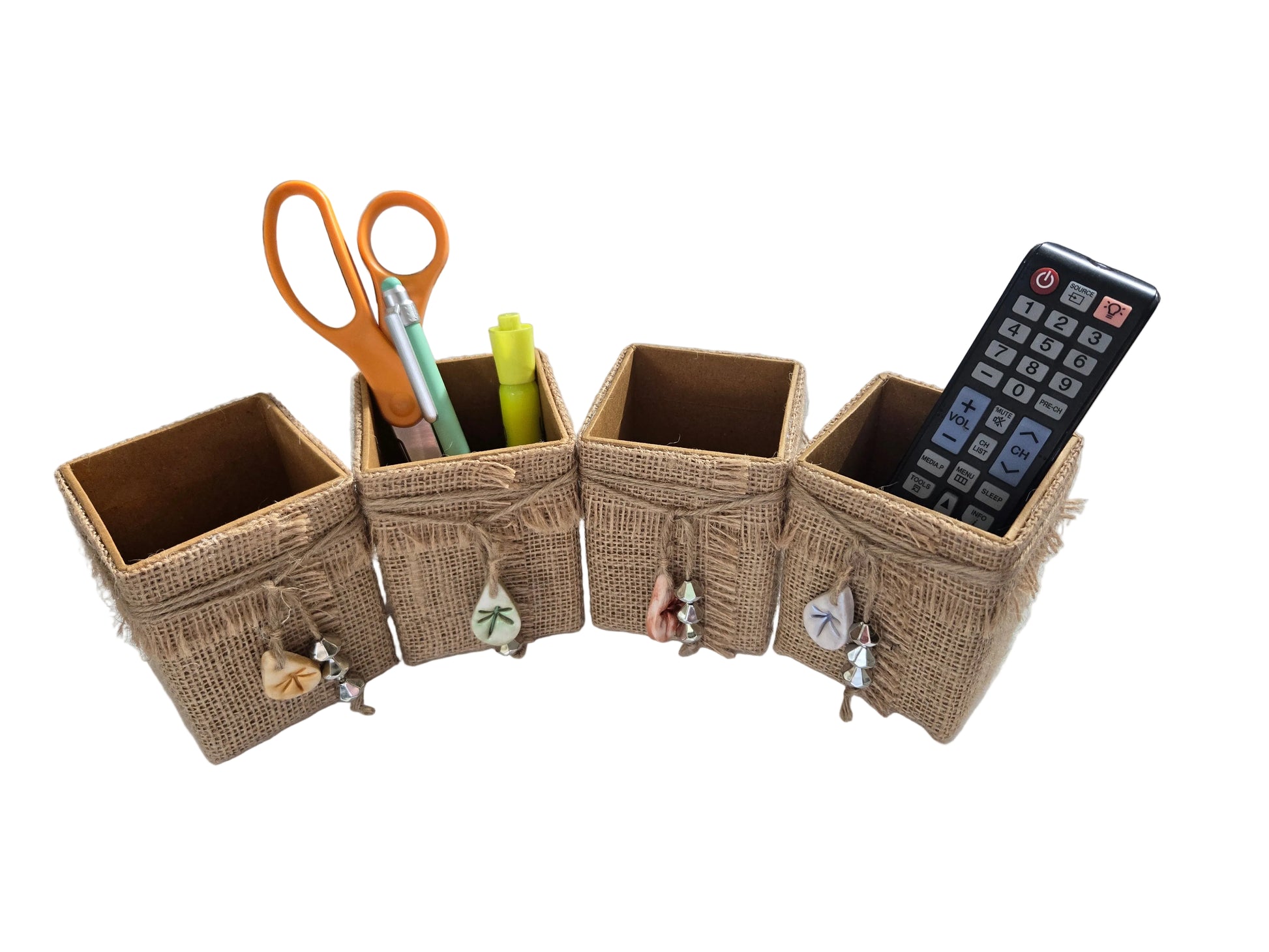 Burlap desk organizer with office supplies on a desk