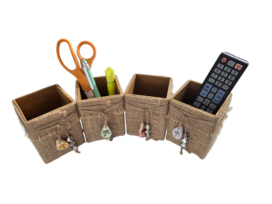 Burlap desk organizer with office supplies on a desk