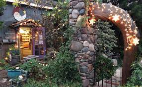 Stone gate and storefront decorated for holiday